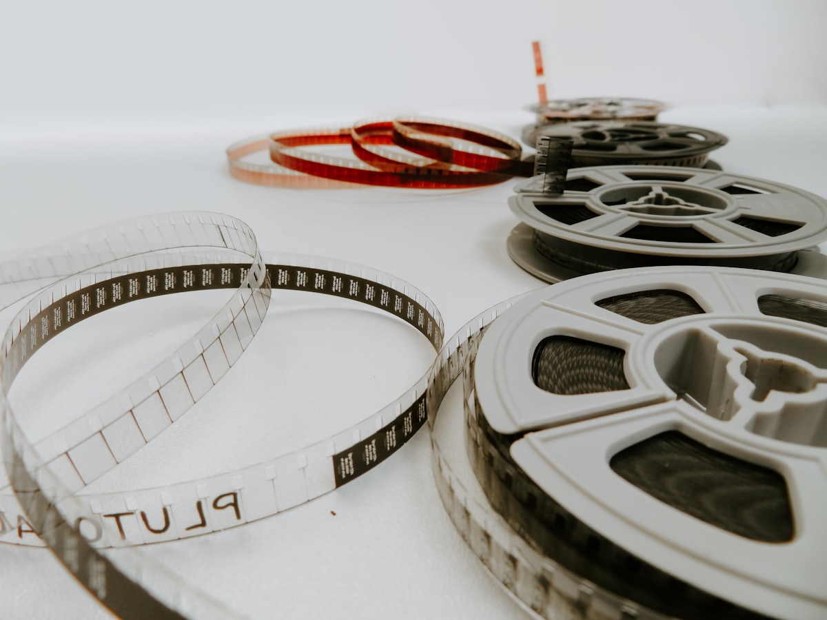 Classic film reels on a white background