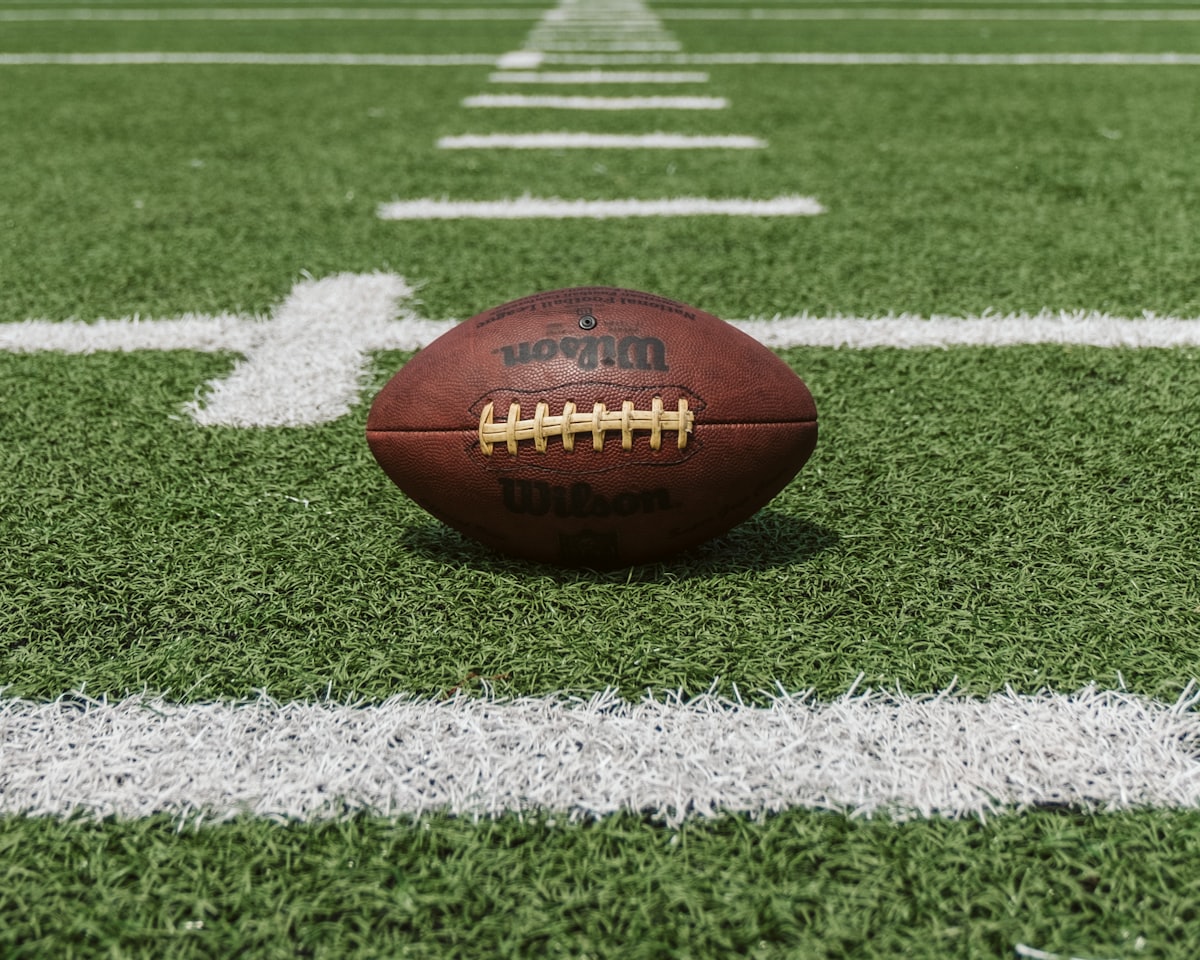 American football on the field ready for kickoff